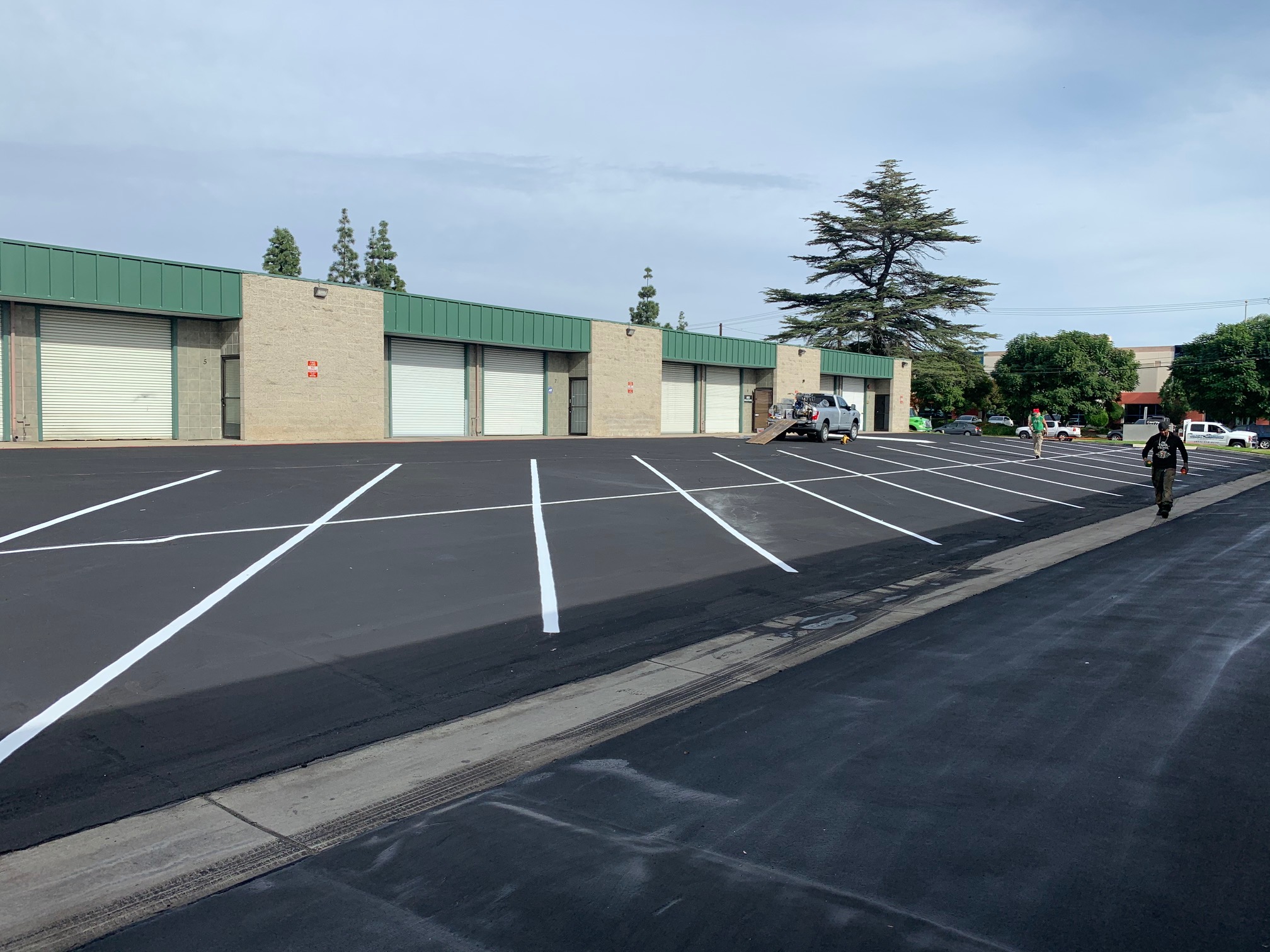 Stripes visible in the parking area in front of the office